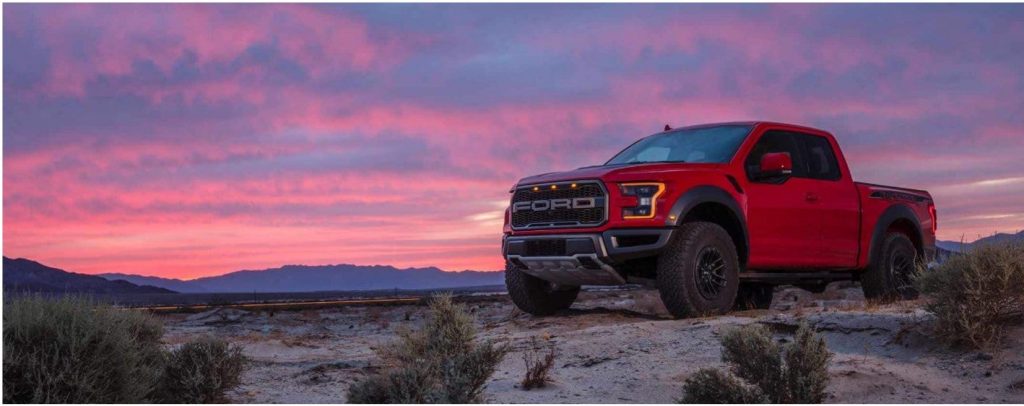red ford truck with pink sunset