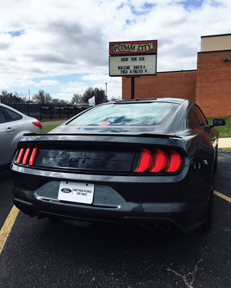 Ford Mustang outside of Putnam City Highschool