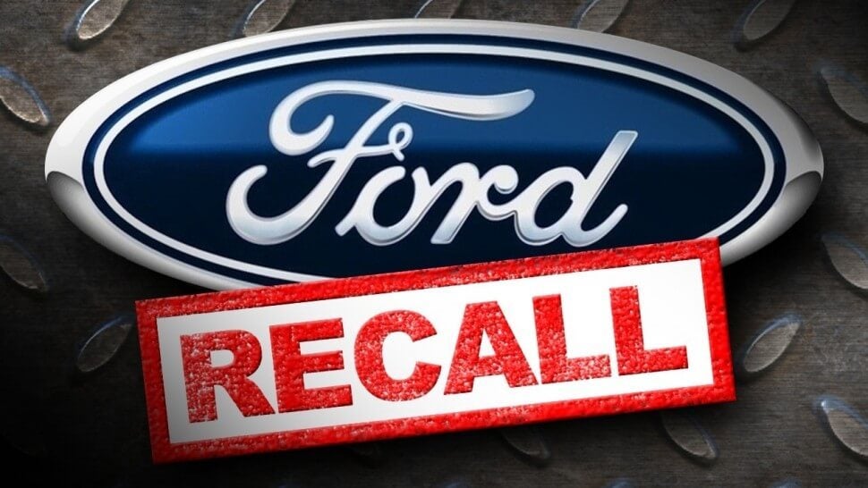 An image of the ford logo with a stamp saying "recall" over it
